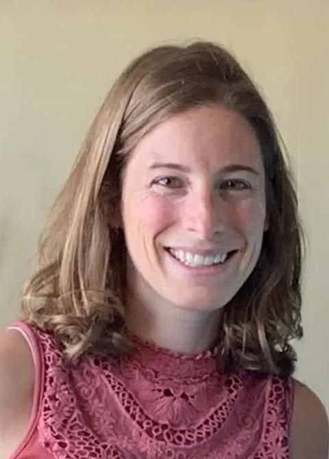 Dr. Tai Scelfo smiling in a pink shirt. She has blonde hair.